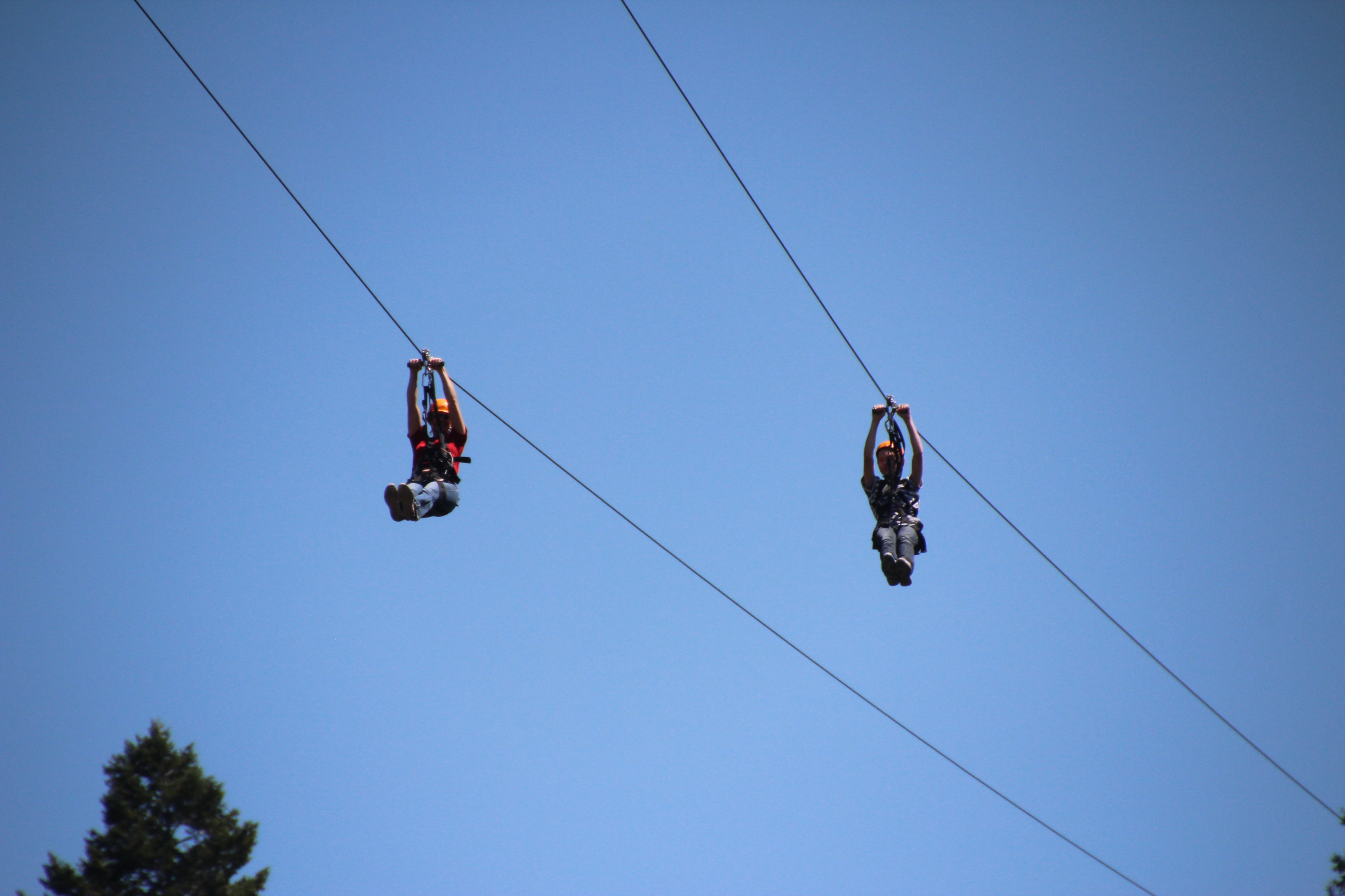 My son, John and I zipping through the trees here in Idaho.